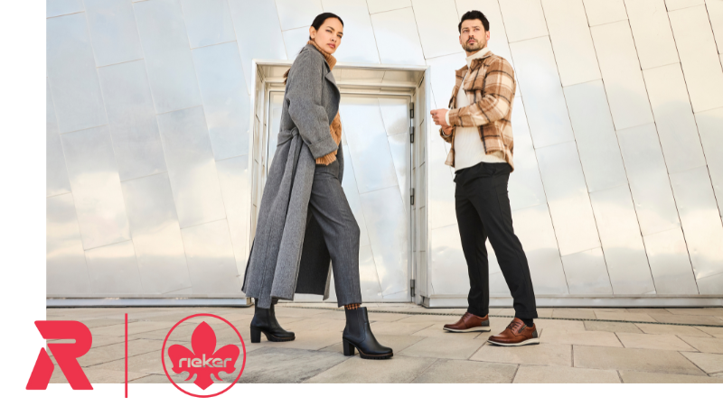 Two models in stylish coats and jackets wear black boots and brown shoes.